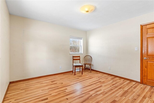 unfurnished room featuring light hardwood / wood-style flooring