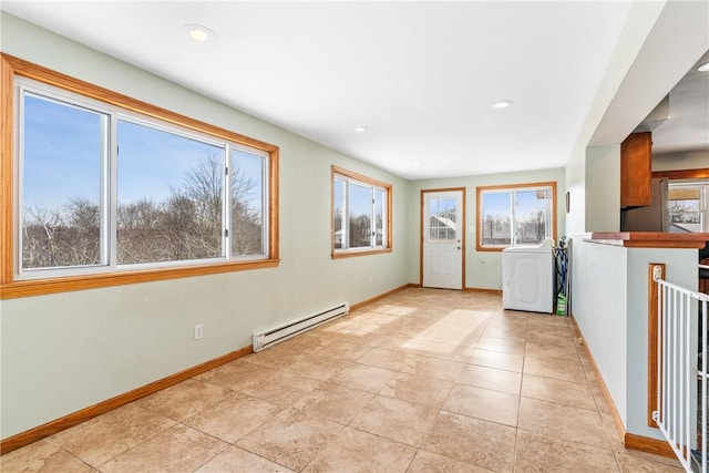 interior space with a baseboard radiator and light tile patterned floors