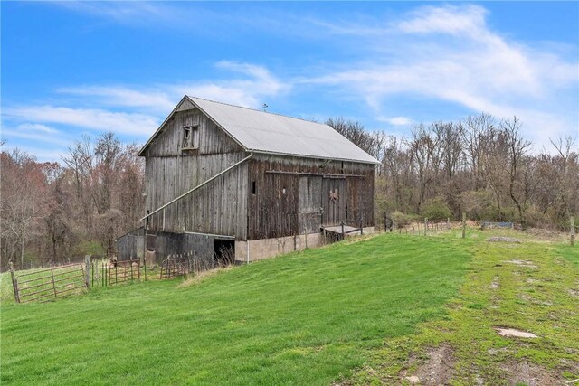 316 Noll Rd, Hanover Twp Bea, PA 15043 - view of barn featuring fence and a lawn