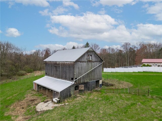 316 Noll Rd, Hanover Twp Bea, PA 15043 - view of barn with a yard and fence