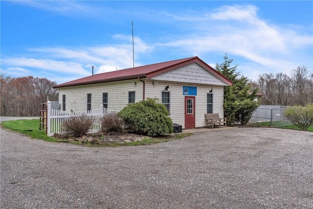 316 Noll Rd, Hanover Twp Bea, PA 15043 - view of home's exterior with fence and metal roof