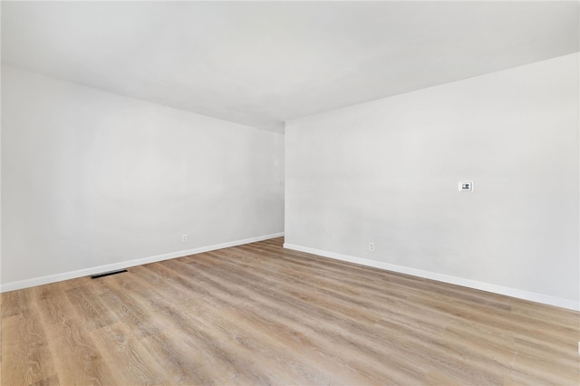 empty room featuring light hardwood / wood-style floors