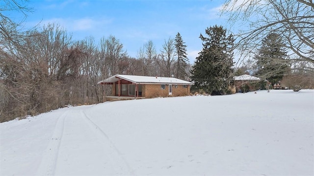 view of yard covered in snow