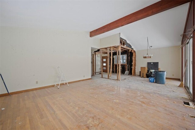 2461 Henry Ln, Franklin Park, PA 15143 - unfurnished living room featuring baseboards and wood finished floors