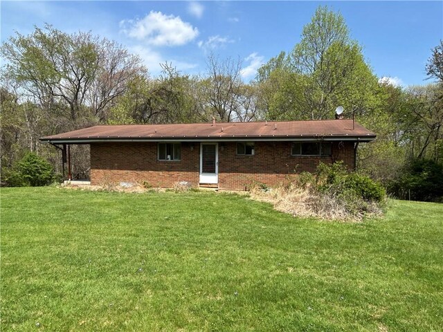 2461 Henry Ln, Franklin Park, PA 15143 - back of house with brick siding and a yard