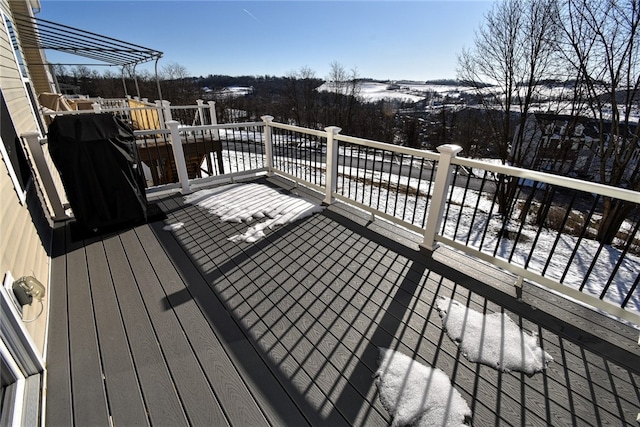 view of snow covered deck