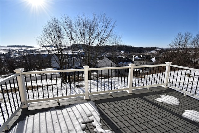 view of snow covered deck