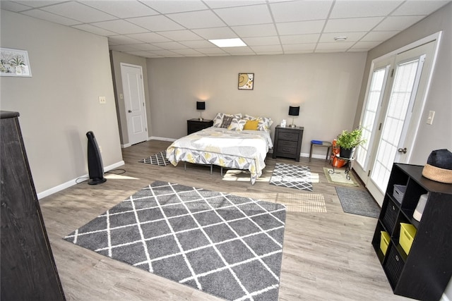 bedroom with wood-type flooring