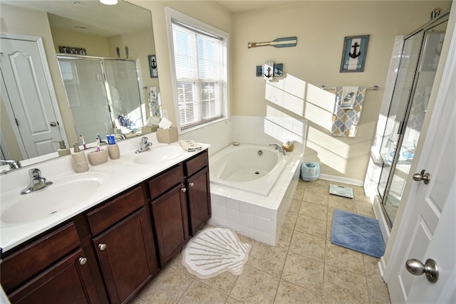 bathroom featuring vanity, tile patterned floors, and plus walk in shower