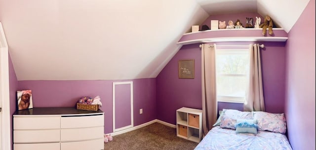 bedroom featuring vaulted ceiling and carpet floors