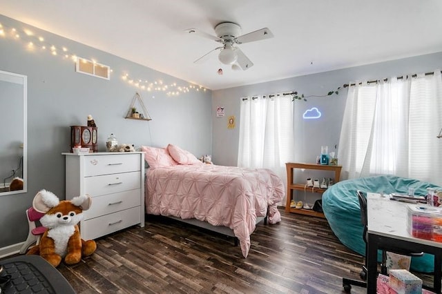 bedroom featuring dark wood-type flooring and ceiling fan