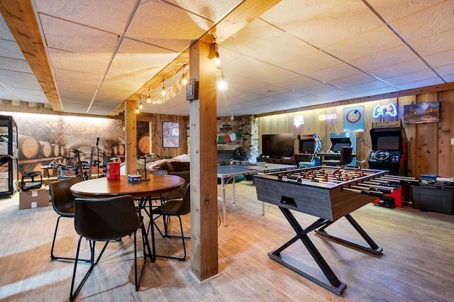 recreation room with hardwood / wood-style flooring