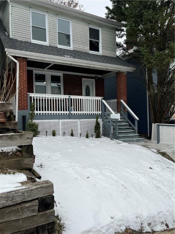 front facade featuring a porch