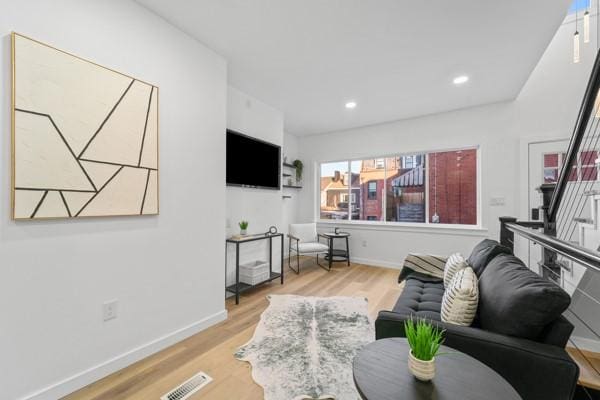 living room featuring light wood-type flooring