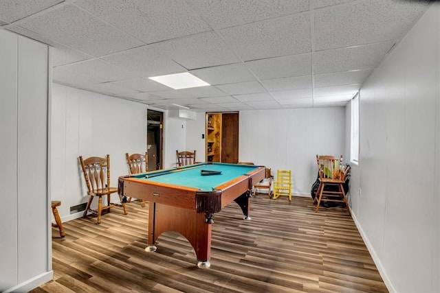 game room with hardwood / wood-style flooring, billiards, and a drop ceiling