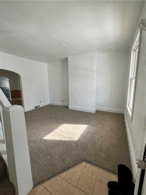 view of carpeted spare room