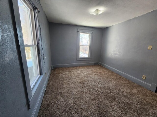 view of carpeted spare room