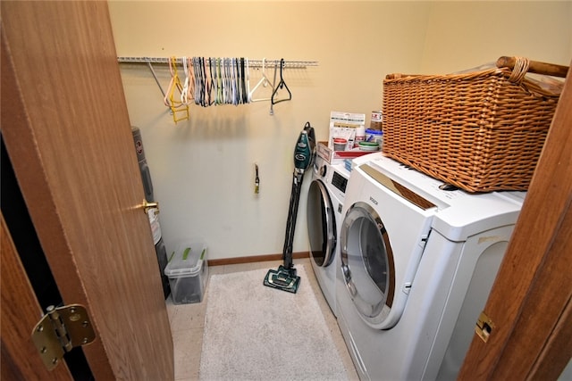 laundry room with independent washer and dryer