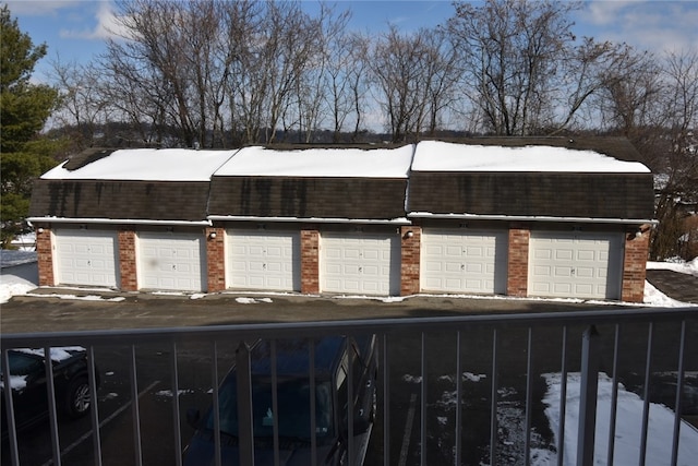 view of snow covered garage