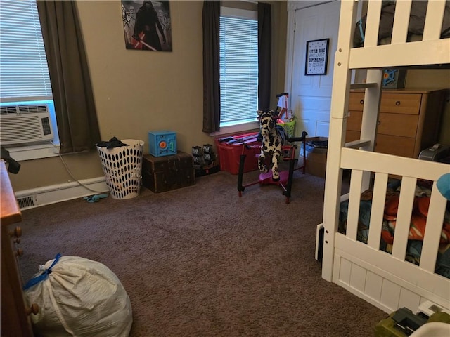 carpeted bedroom with cooling unit and a baseboard radiator