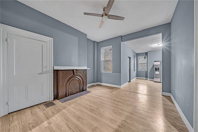 interior space featuring ceiling fan and light hardwood / wood-style floors