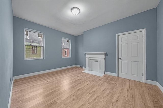 empty room with light wood-type flooring