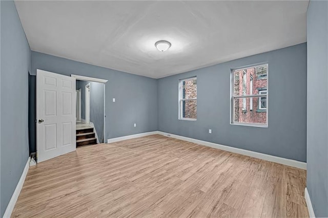 unfurnished bedroom with light hardwood / wood-style flooring