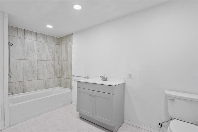 full bathroom featuring vanity, toilet, and washtub / shower combination