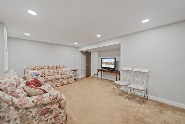 living room featuring light carpet