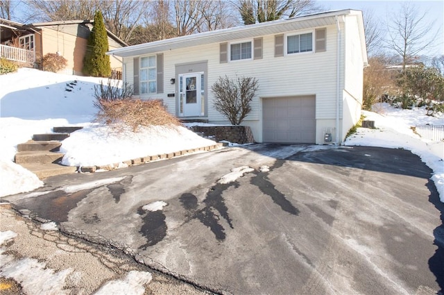 view of front of property featuring a garage