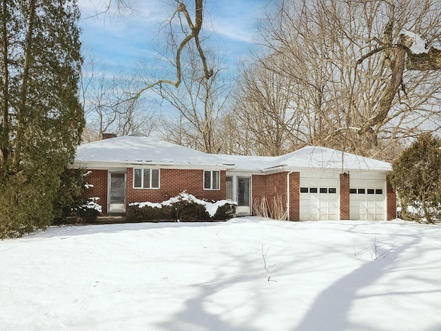 single story home featuring a garage