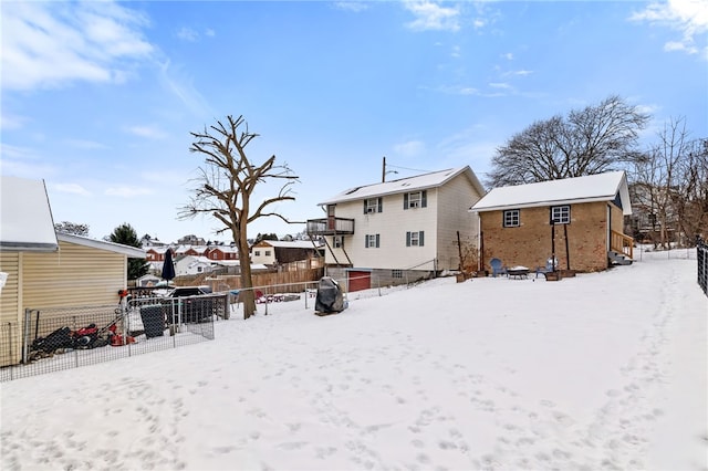 view of snow covered house