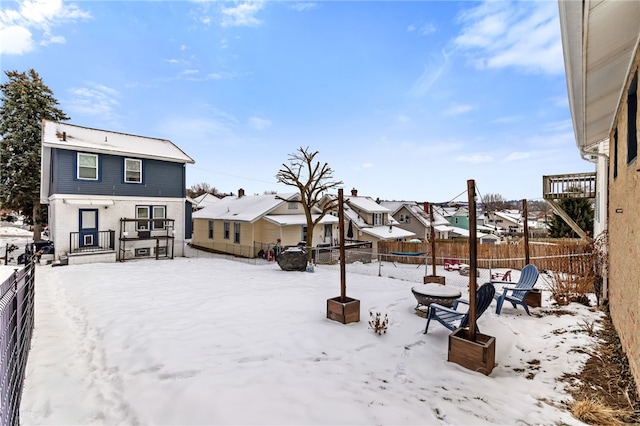 view of yard layered in snow