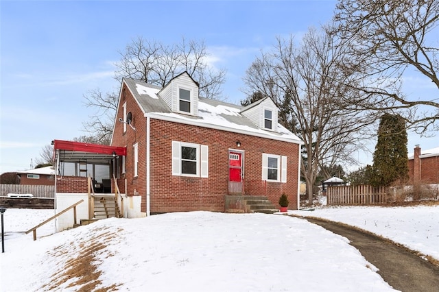 view of new england style home