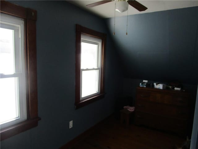 interior space featuring ceiling fan