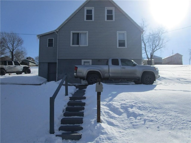 view of snow covered house