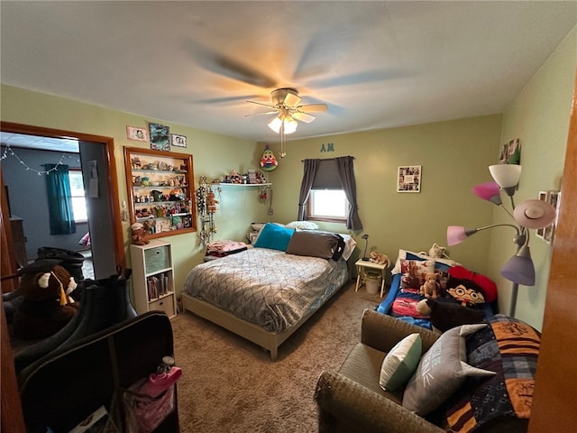 bedroom with multiple windows, carpet floors, and ceiling fan