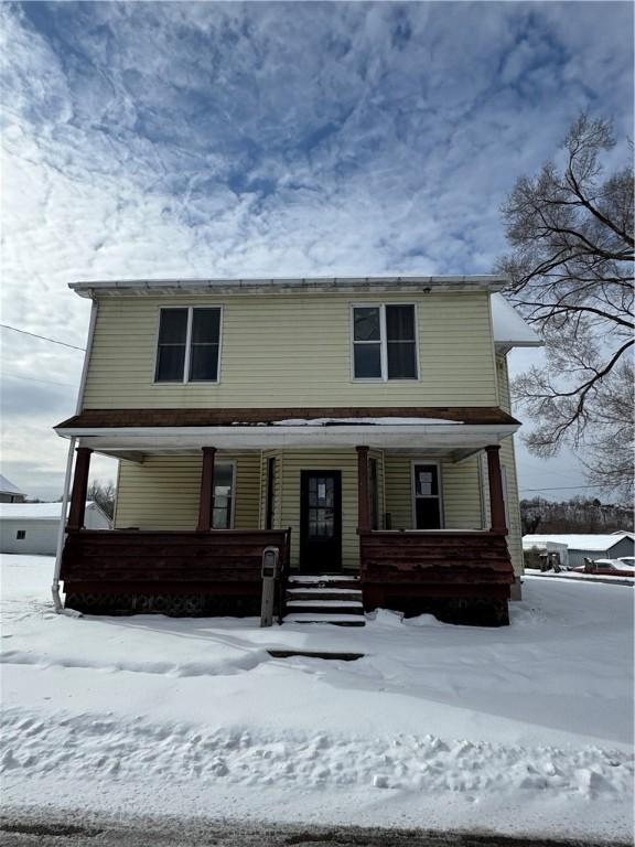 front facade featuring covered porch