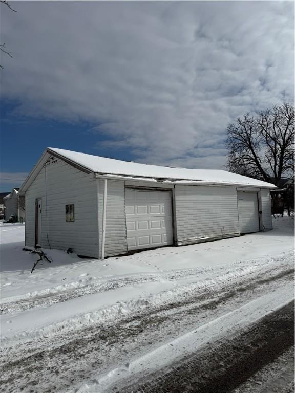 view of snow covered garage