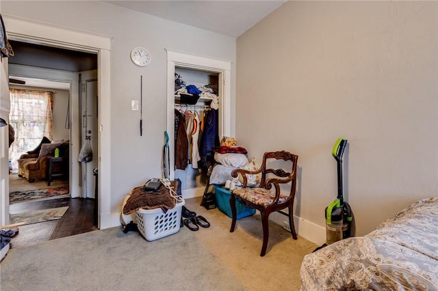 carpeted bedroom with a closet