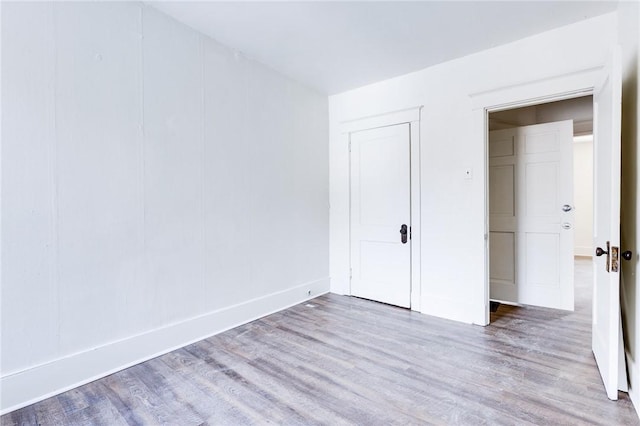 unfurnished bedroom featuring light hardwood / wood-style floors