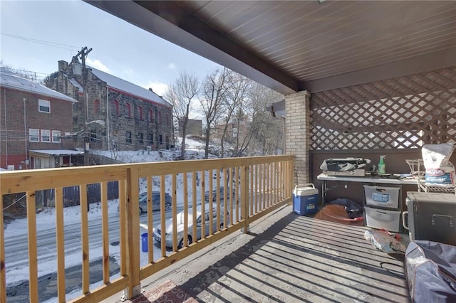 view of snow covered deck