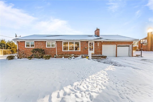 single story home with a garage