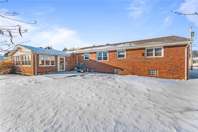 view of snow covered property