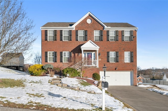 colonial home with a garage