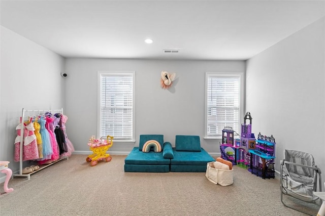 recreation room with recessed lighting, carpet, a wealth of natural light, and baseboards