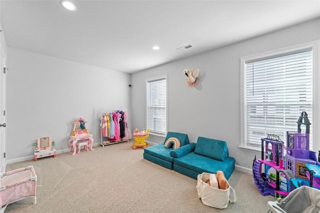 recreation room featuring carpet floors, recessed lighting, visible vents, and baseboards