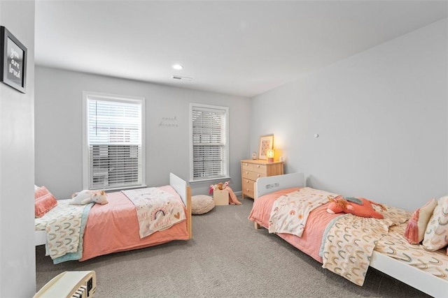 bedroom featuring recessed lighting and carpet flooring