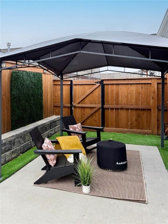 view of patio with fence