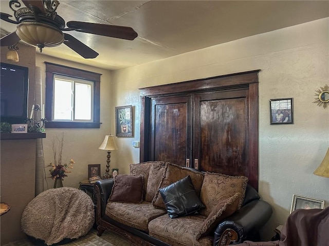 living room with ceiling fan